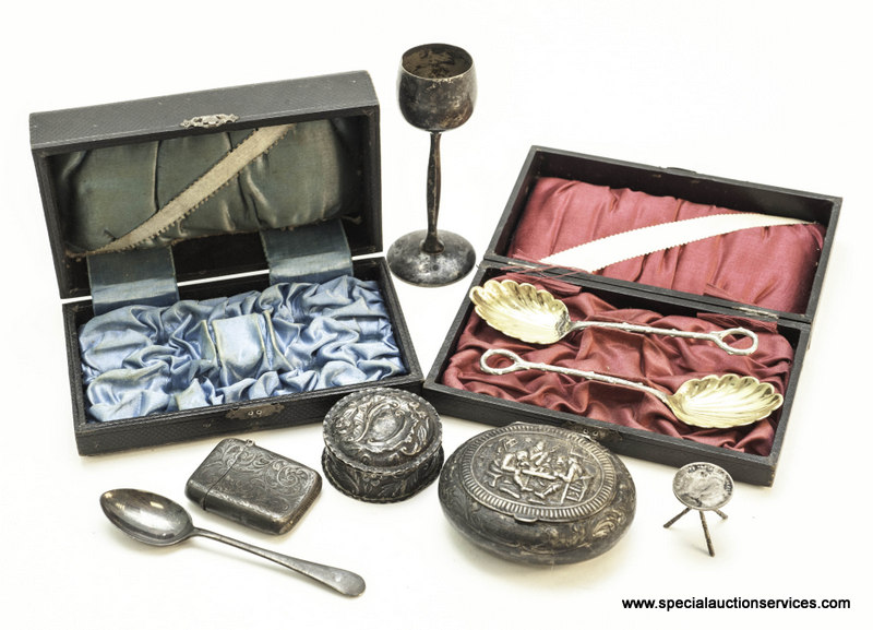 A silver vesta case, marked Birmingham 1897, together with a selection of silver and white metal