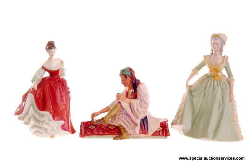 Three porcelain figural groups, including Franklin porcelain `Marie Antoinette`, Royal Doulton `