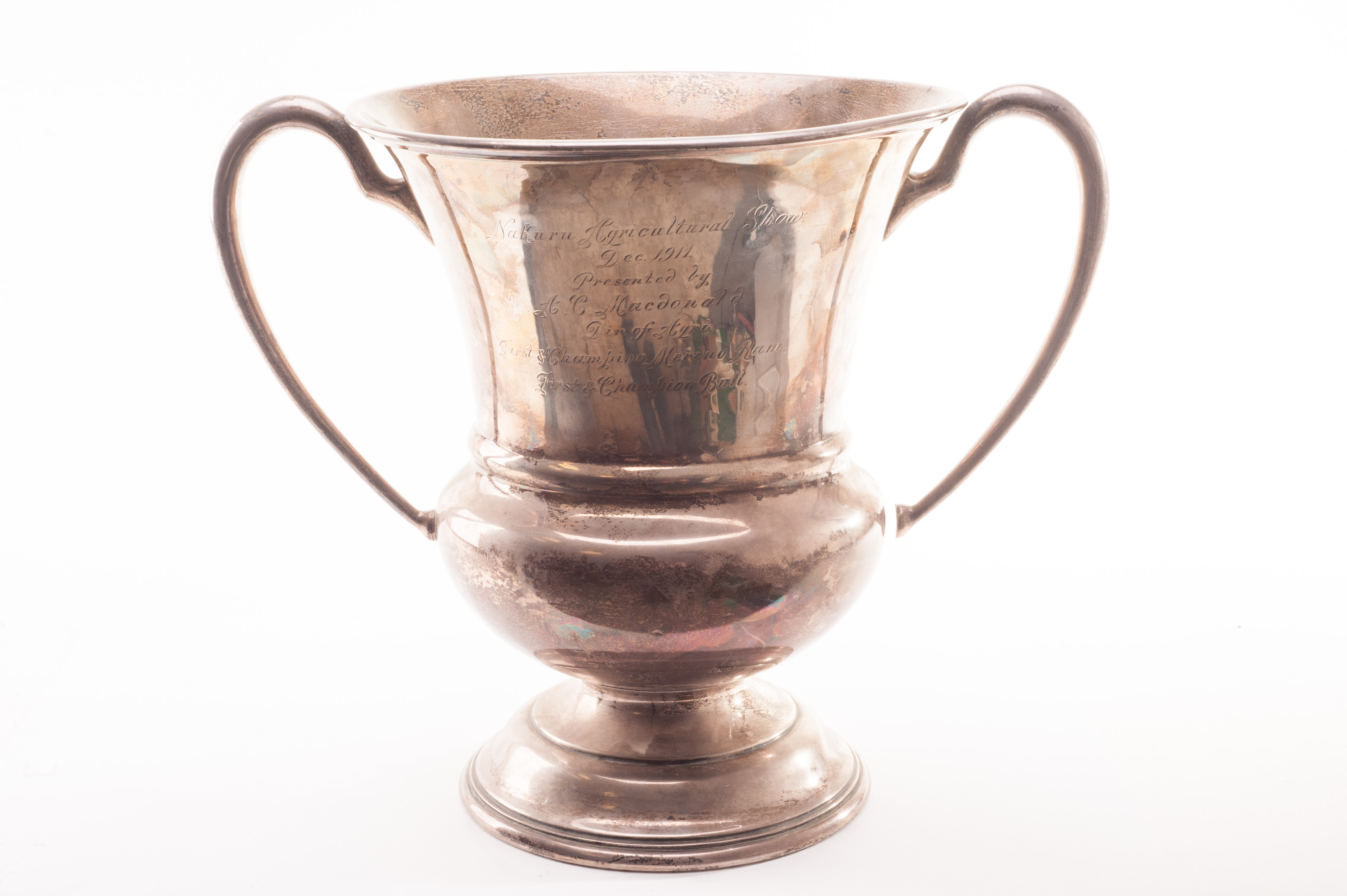 A large Edward VII silver twin handled trophy, presented from the Nakura in Kenya Agricultural Show
