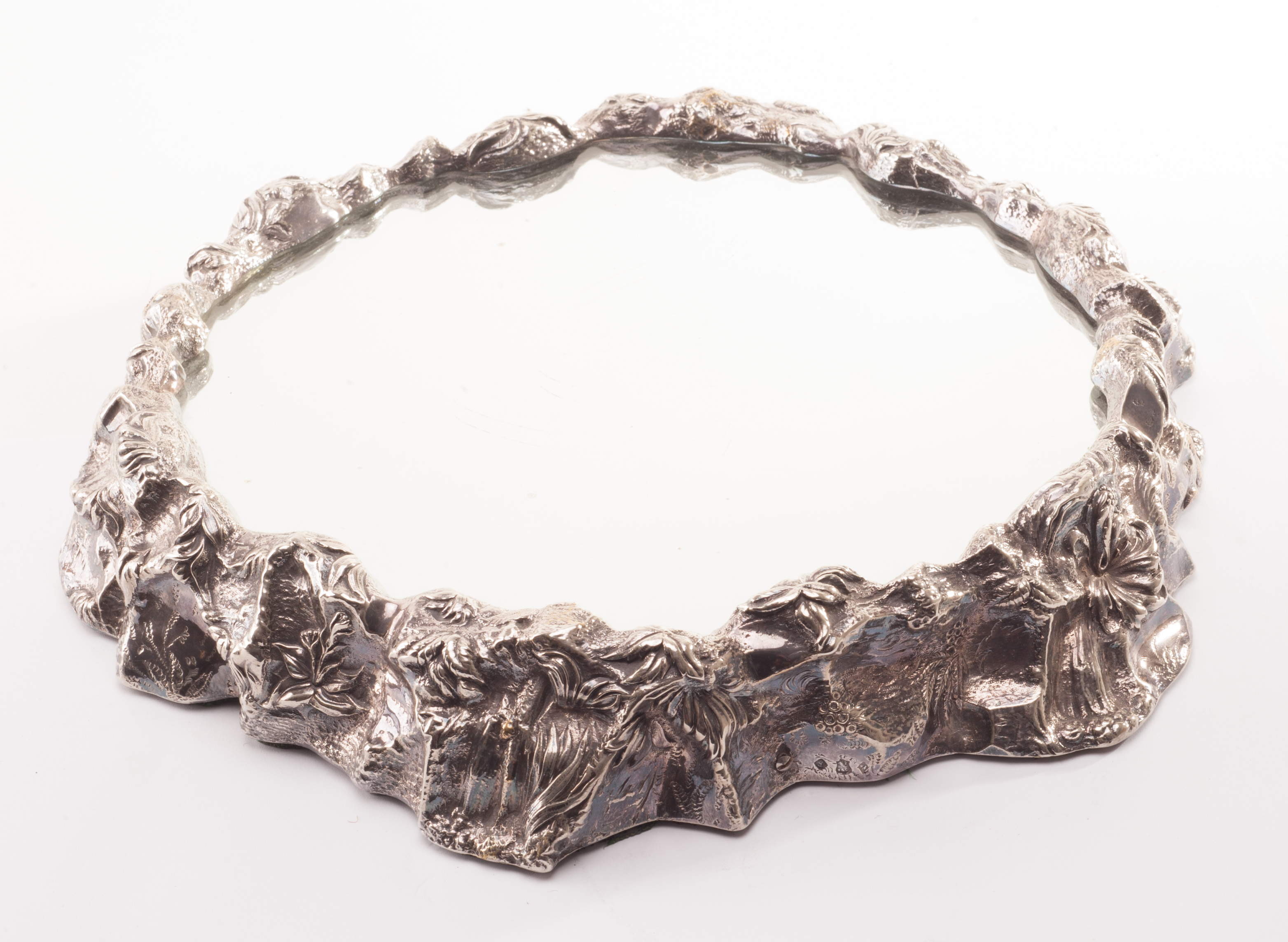 A silver plated centre piece from Elkington & Co, Circa 1890 the naturalistic circular base with