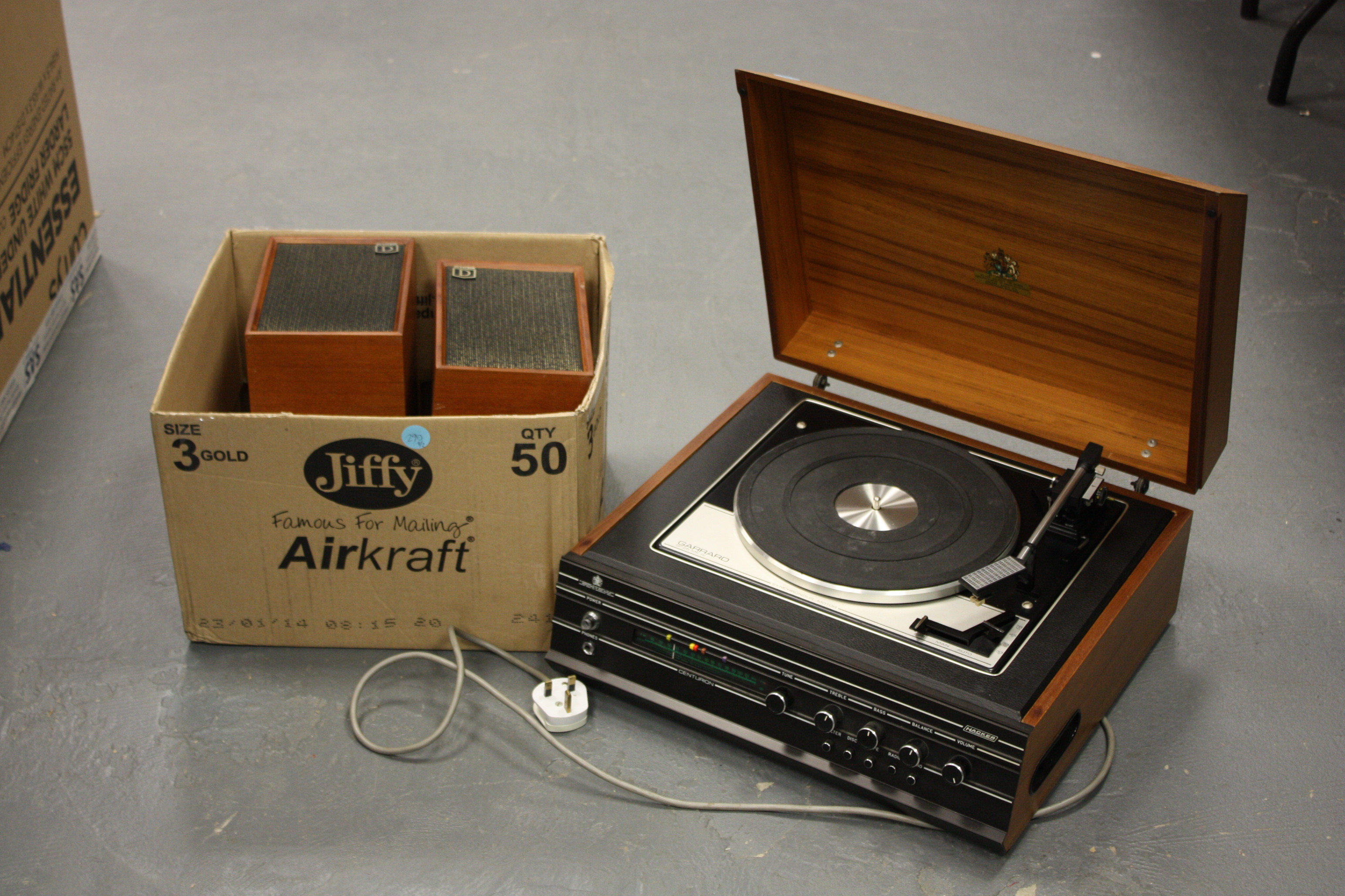 A Hacker Record Player, with Garrard SP25 Mk IV unit, together with two Dynatron speakers (a lot)