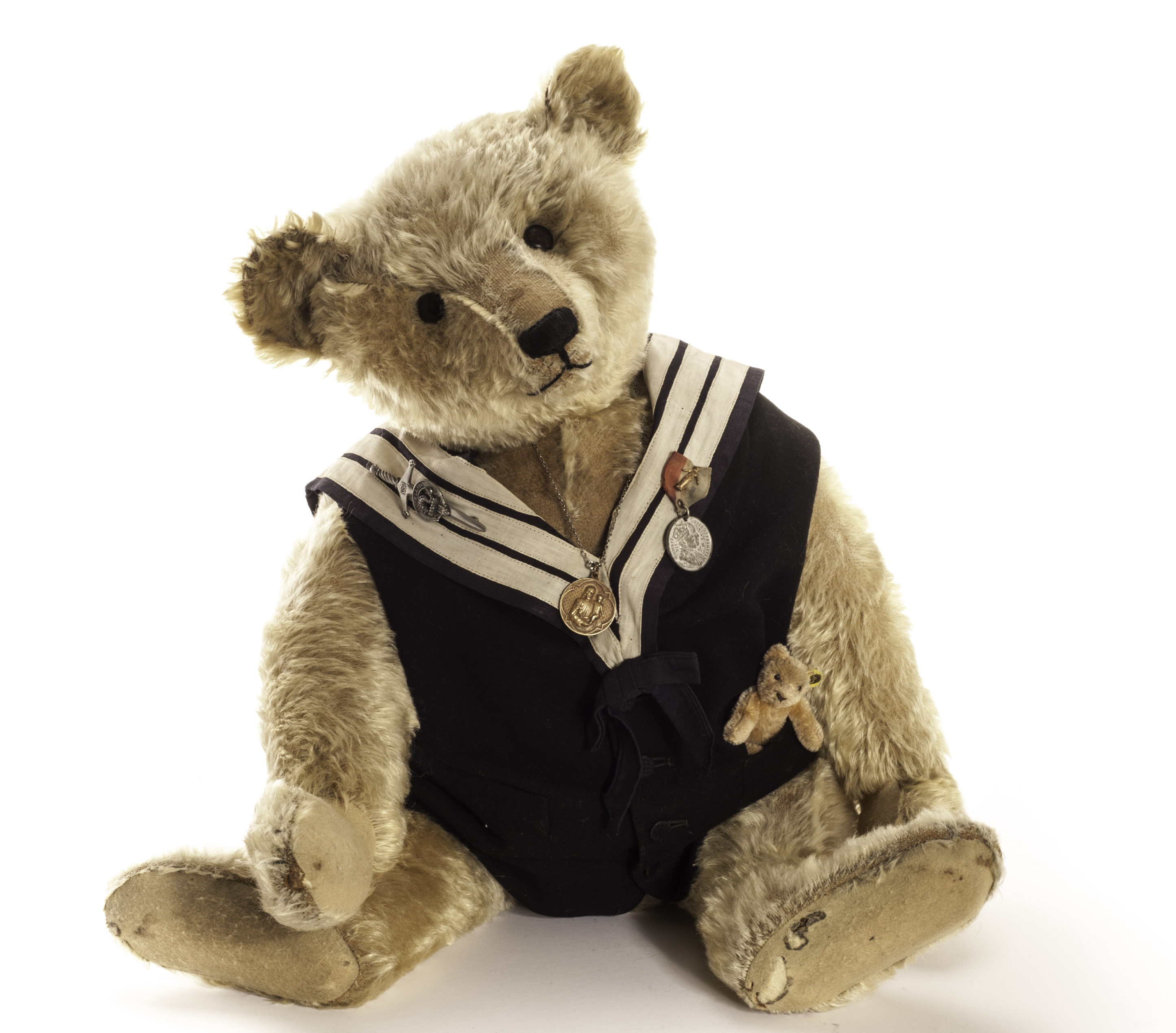A large early Steiff Teddy Bear, circa 1908, with blonde mohair, back boot button eyes, pronounced