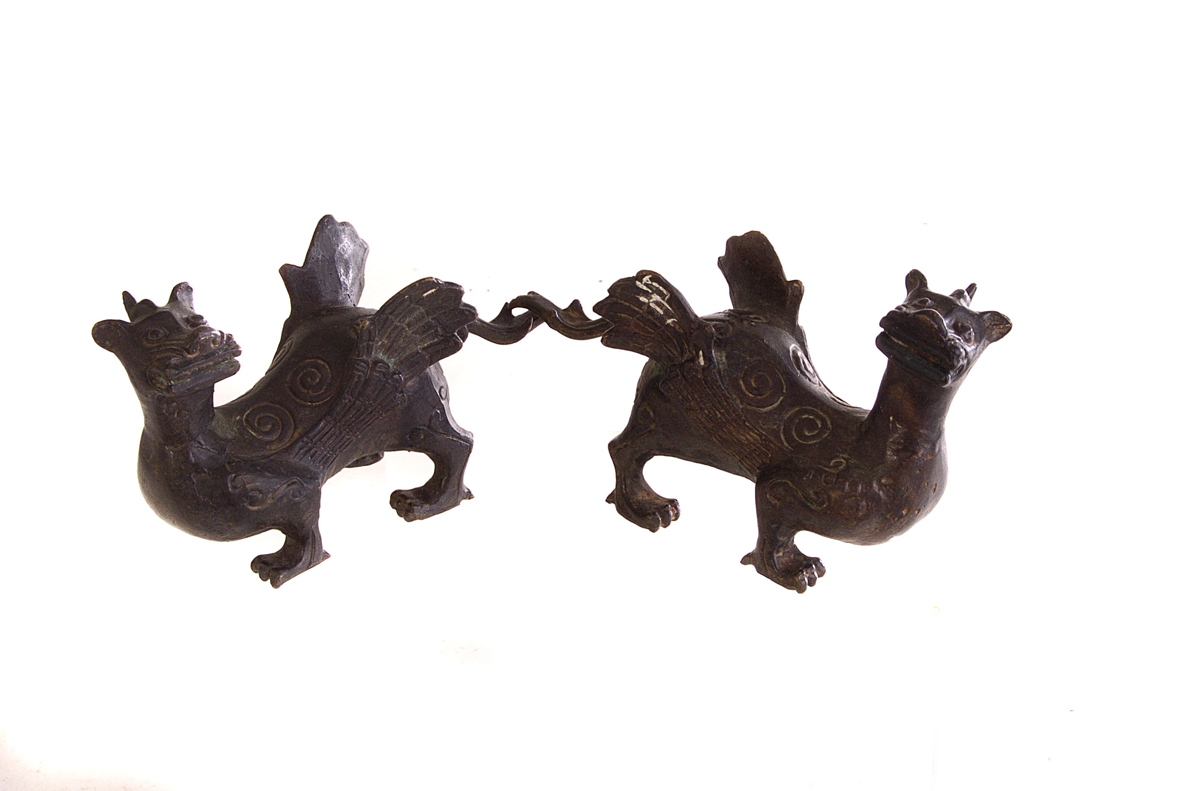 A pair of bronze Chinese mythical beast figure, in the form of a dragon, unmarked