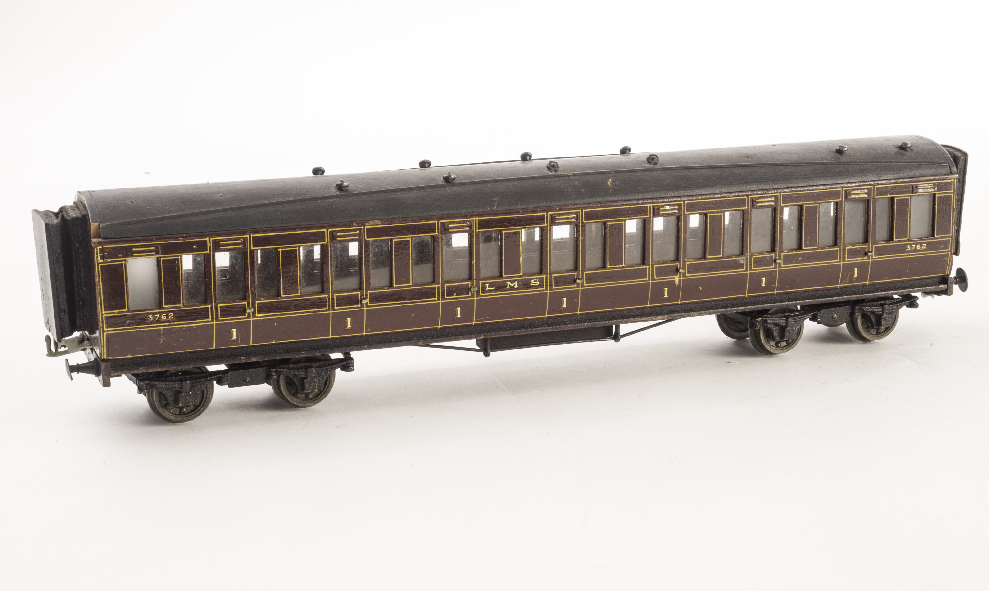 A Millbro 0 Gauge LMS All First Corridor Coach, all wood construction, in crimson lake with black