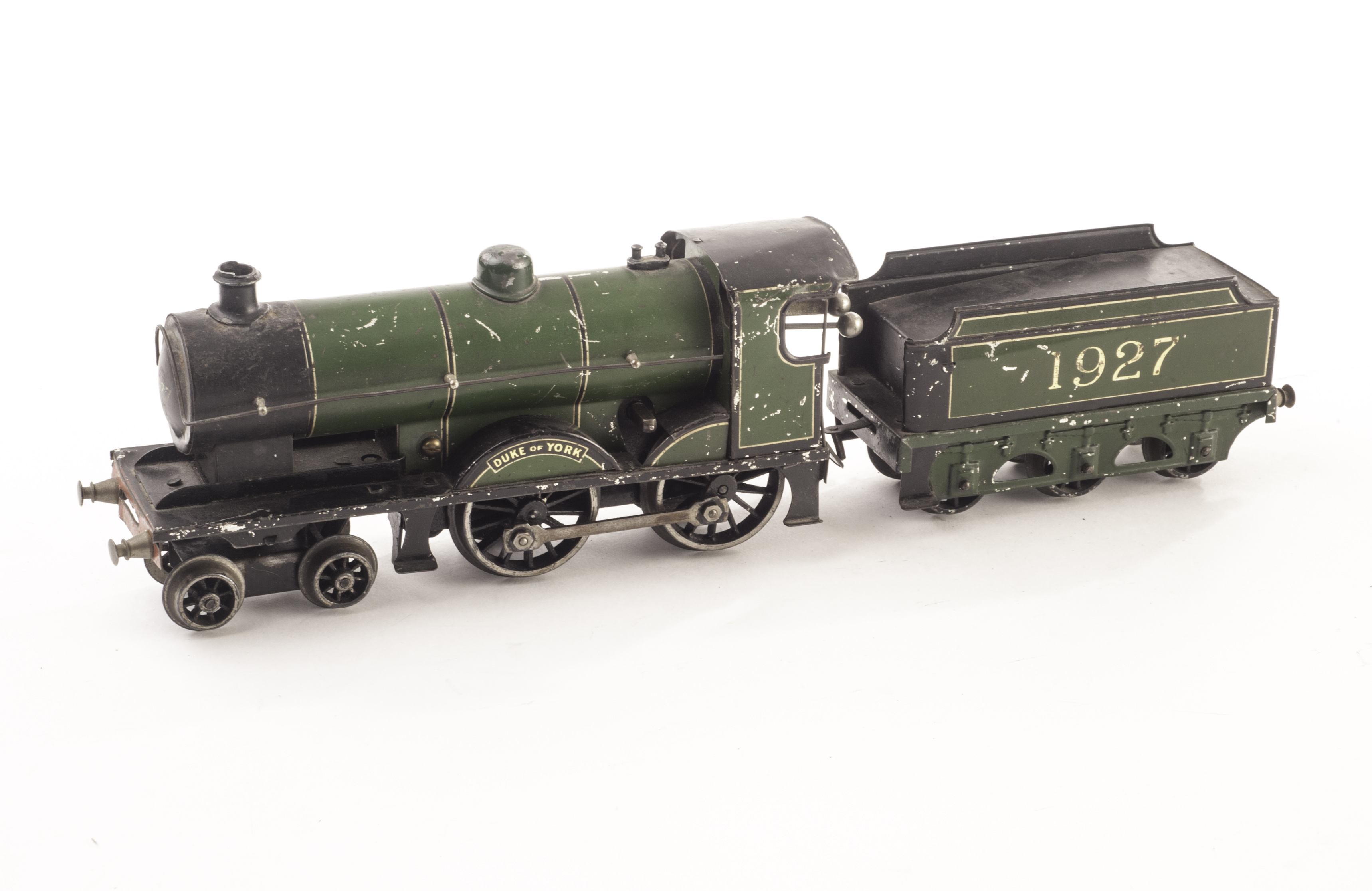 A Bassett-Lowke 0 Gauge Clockwork 4-4-0 ?Duke of York ?Locomotive and Tender No. 1927, green, F