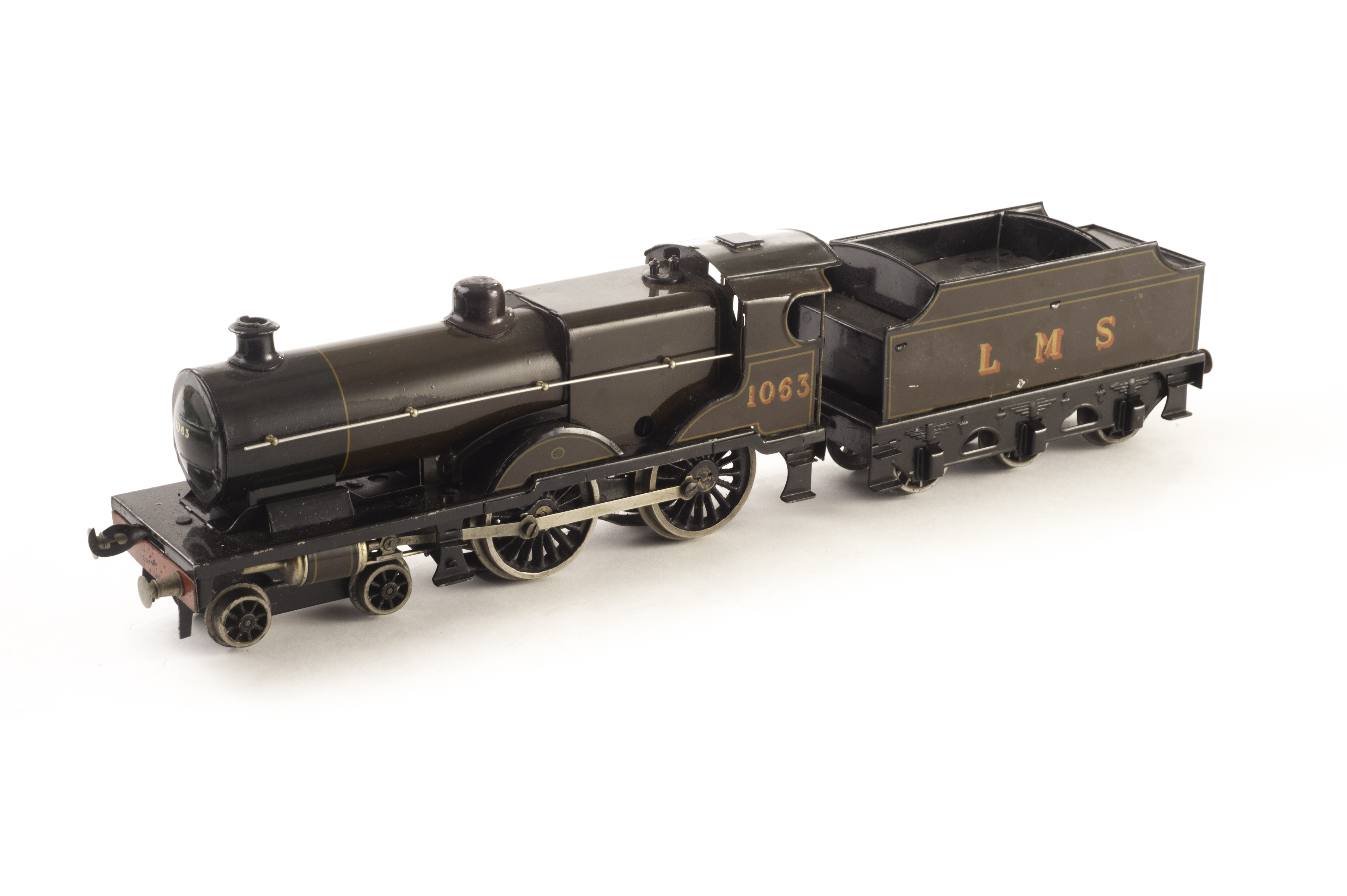 A Bassett-Lowke 0 Gauge Electric 4-4-0 Compound locomotive No.1063 and tender, in LMS Dark Maroon,