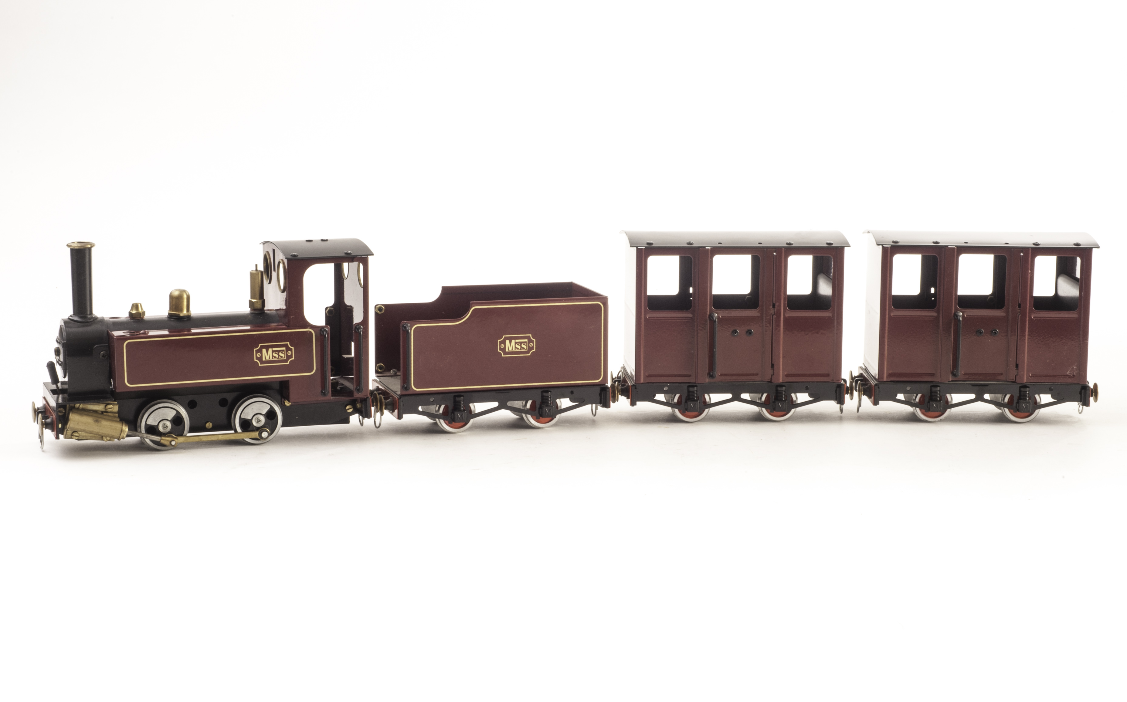 A Mamod MSS Gauge I Live Steam Maroon Train Set, comprising 0-4-0 MSS Locomotive and 4-wheel Tender