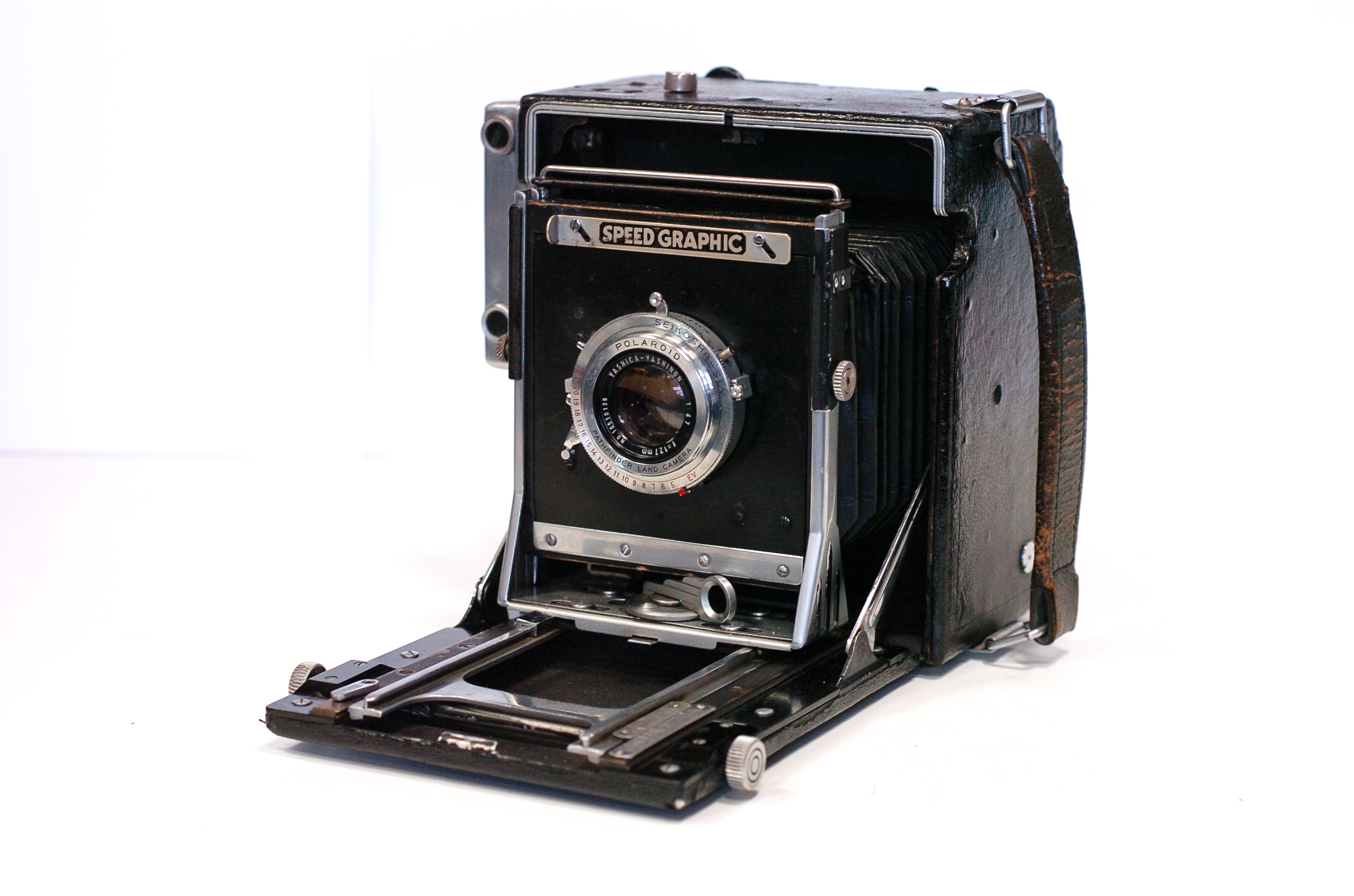 A Graflex Speed Graphic Camera, with Yashica Yashinon f/4.7 127mm lens, in Polaroid shutter, body,