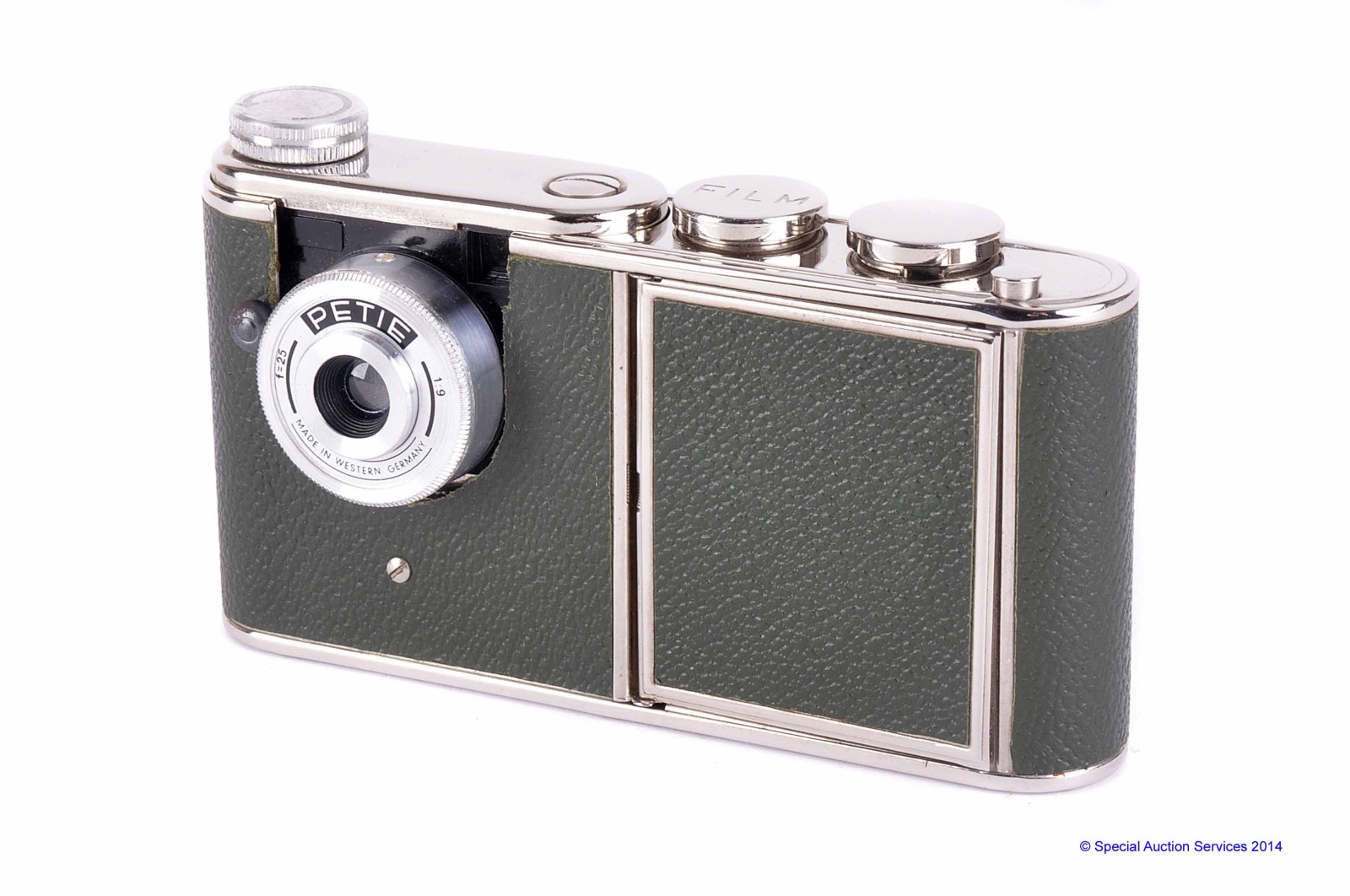 A Kunit Walter Petie Vanity Camera, green, with f/1.9 25mm lens, body, VG-E, shutter working,