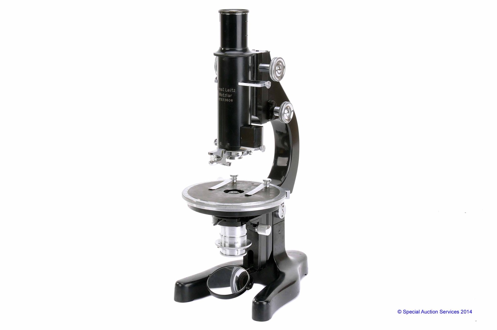 A Leitz black enamelled Petrological Microscope,  with two eyepieces, four objectives and circular