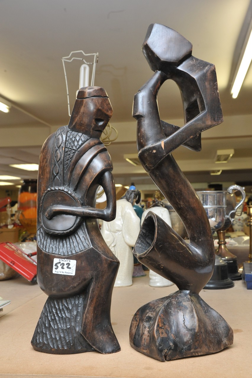 A large pair of wooden tribal figures