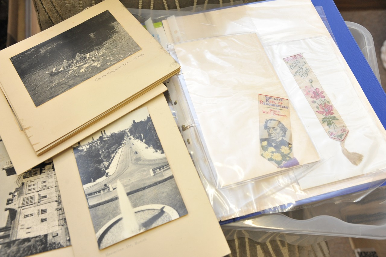 A collection of silk bookmarks, postcards, photos etc