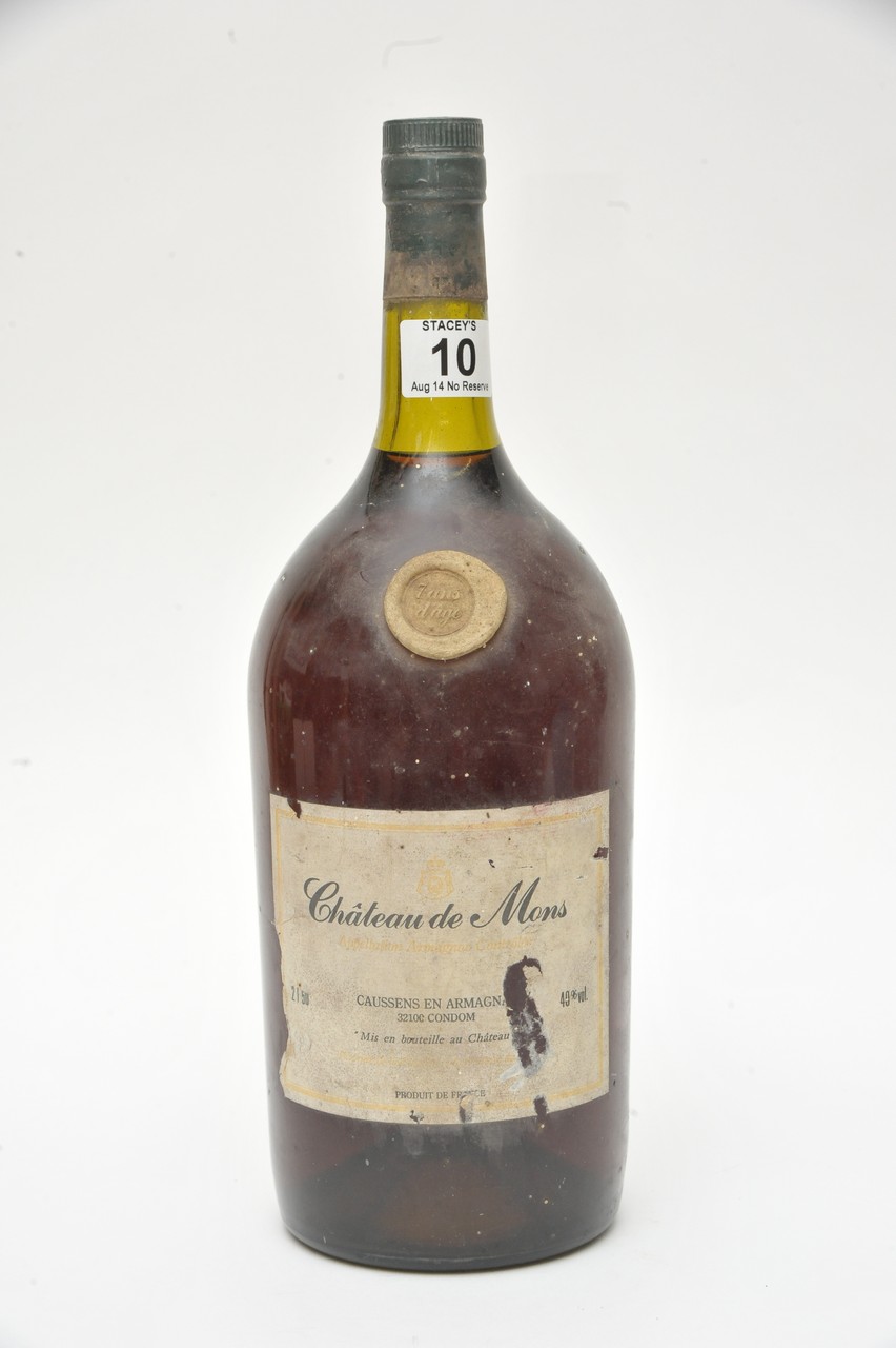 A large vintage bottle of 'Chateau de Mon's