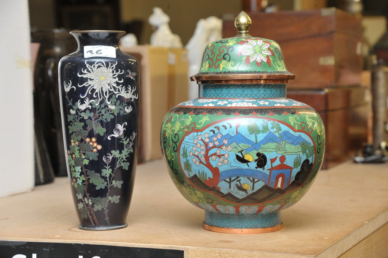 A cloisonne vase and cover and similar blue vase decorated with landscape scene