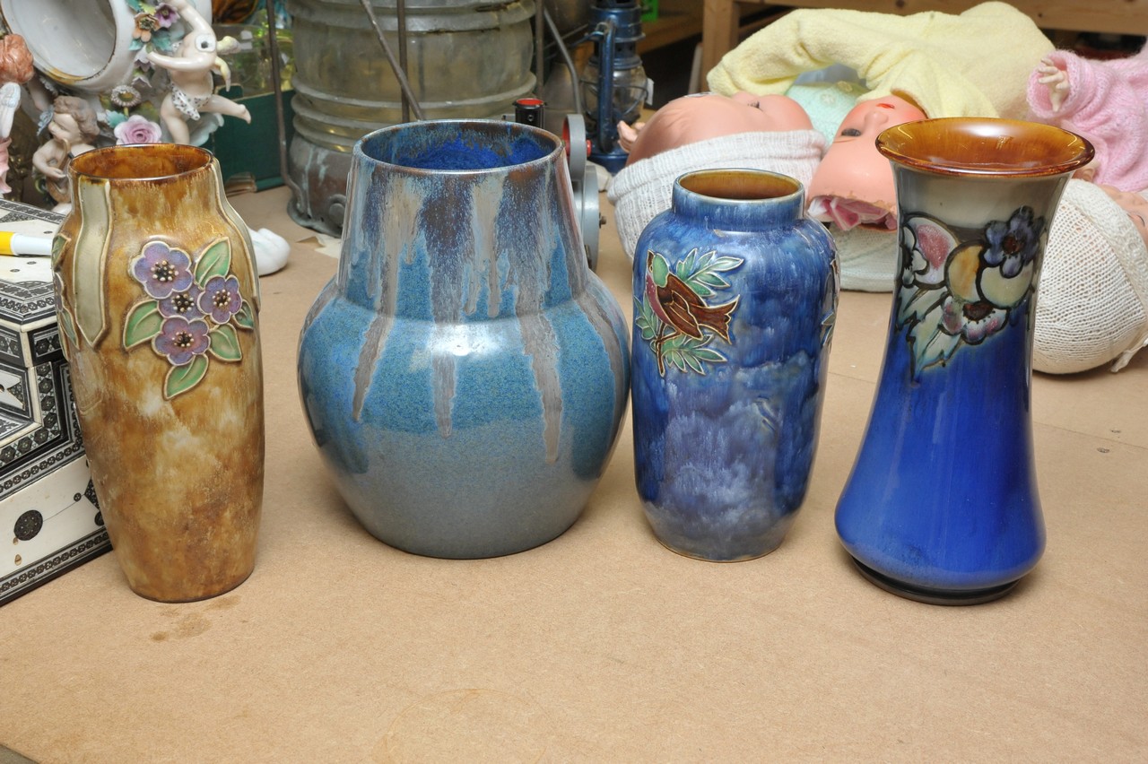 Three Royal Doulton stoneware vases and a drip glaze Thurin Ware vase