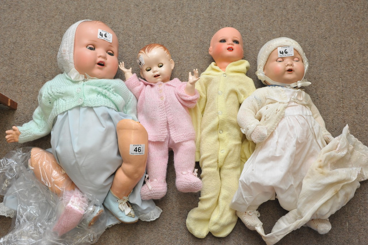 Four old composite dolls