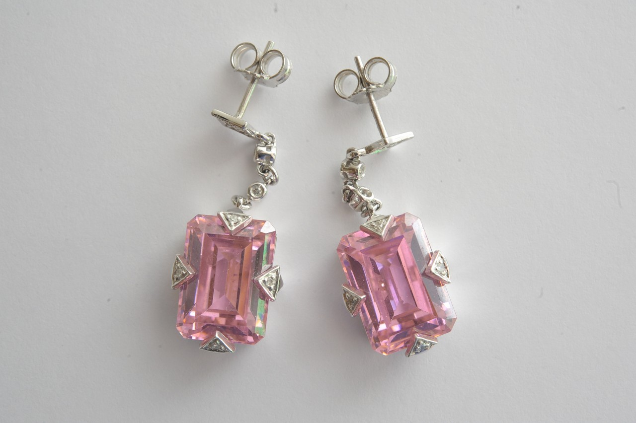 A pair of 9ct white gold drop earrings set with large pink quartz and small diamonds