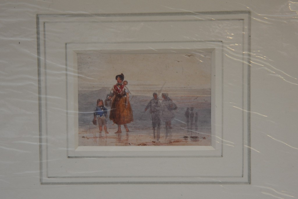 An unframed mounted original watercolour depicting figures on beach, attributed to Charles H Dixon