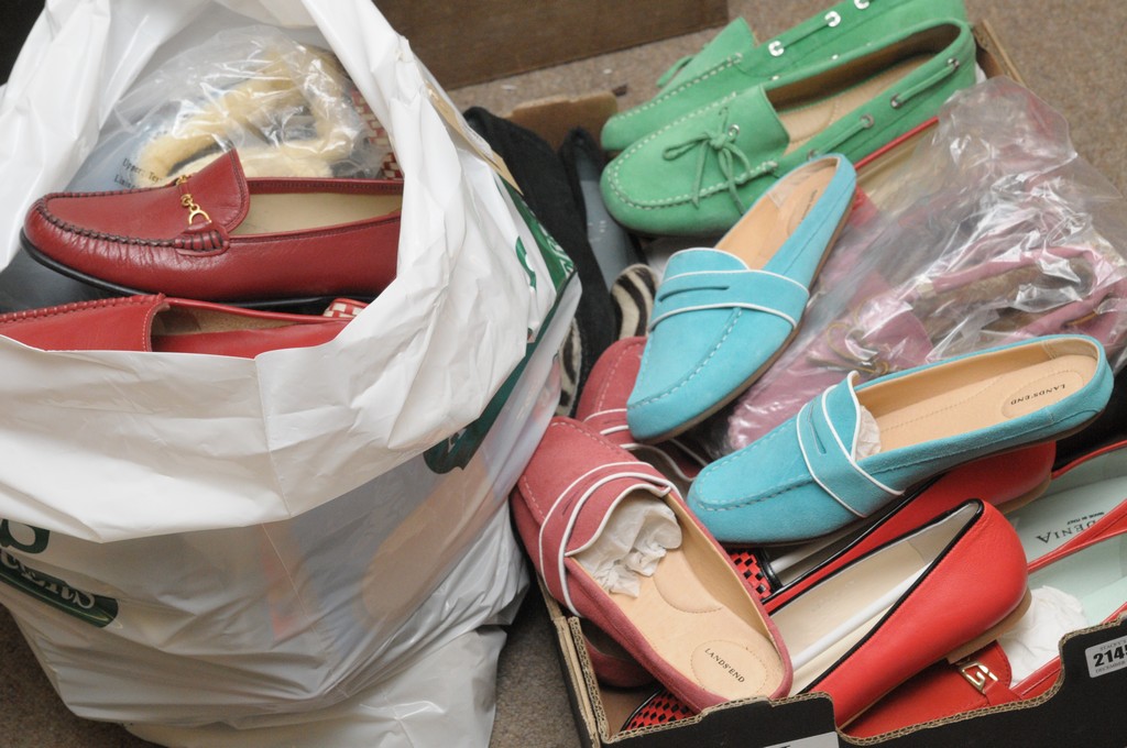 A collection of lady's size 6 designer shoes including many new pairs