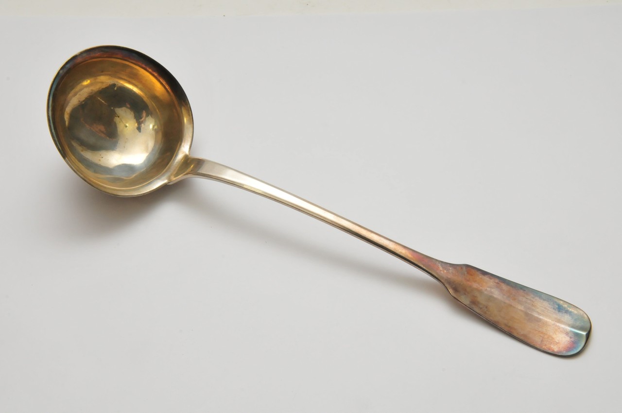 A continental white metal ladle