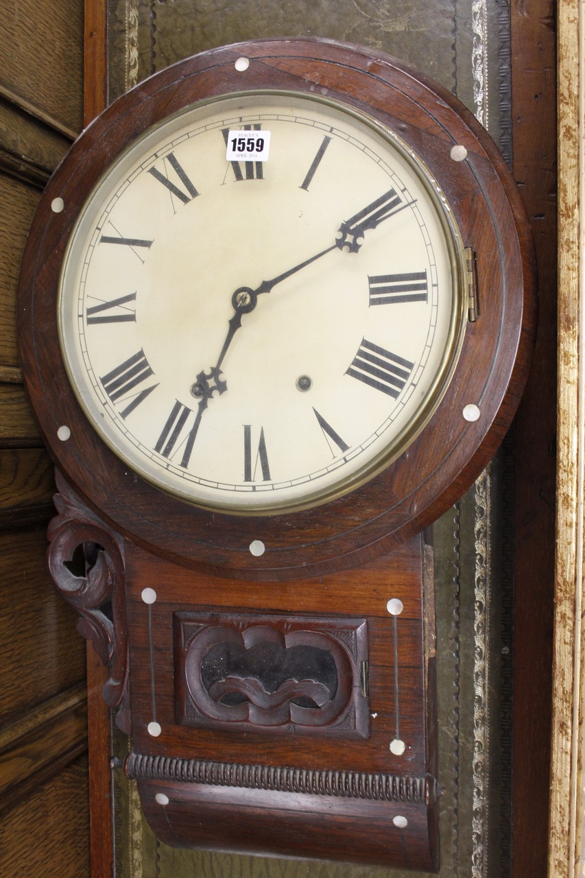 A Rosewood drop dial wall clock inset with mother of pearl