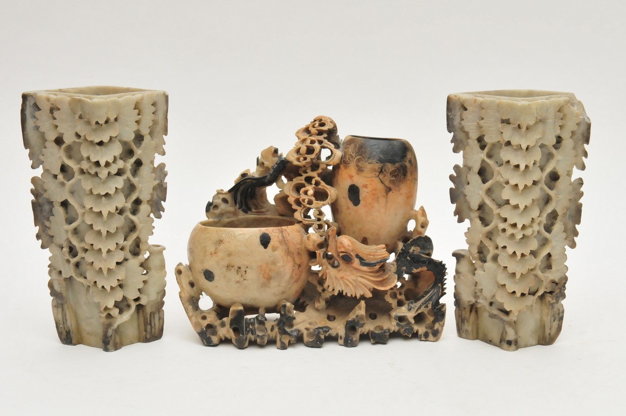 A pair of Chinese carved soapstone vases together with one other soapstone carving with raised