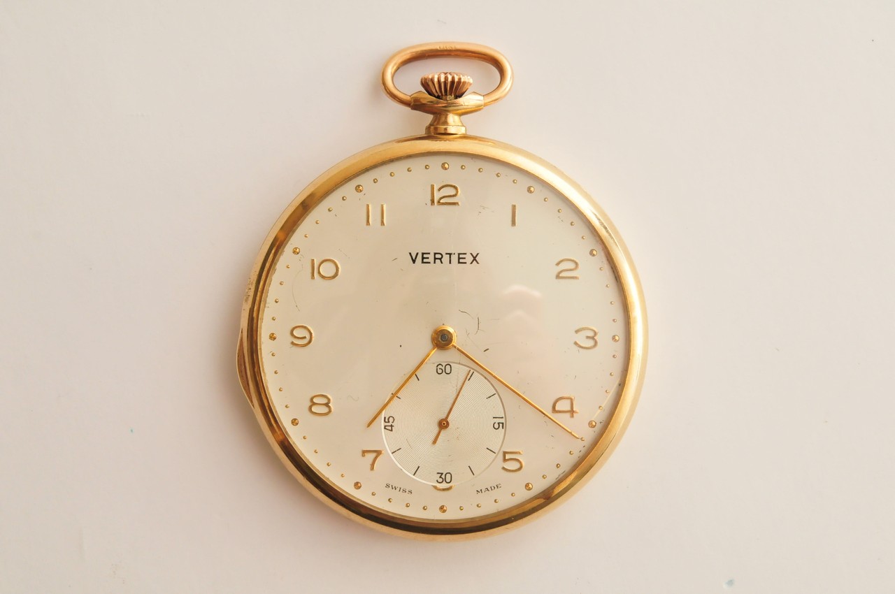 Withdrawn - A 9ct gold button wind Vertex pocket watch, thin back