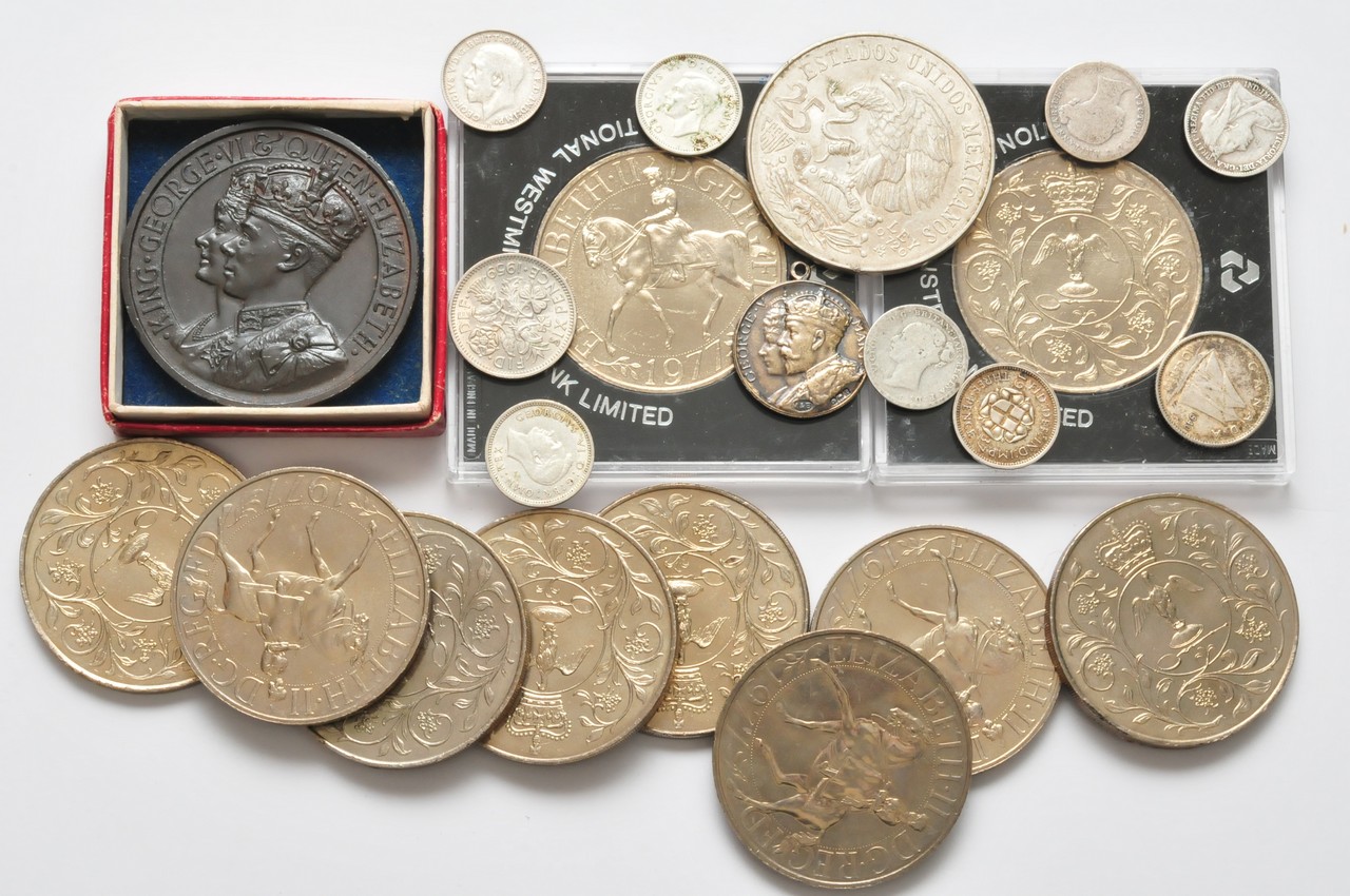 A collection of various coins including some silver and cased crowns