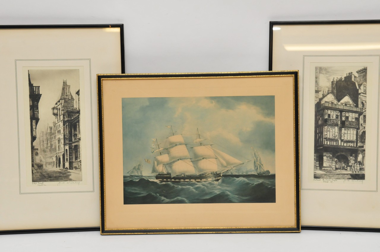 A pair of framed etchings depicting London street views signed in pencil by the artist J. M Wiley of
