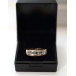 18ct Yellow Gold Baguette Diamond Ring. Diamonds totalling 1 Carat. Size O. 6.55 Grams