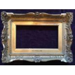 19th century swept composition frame, inset: 10.5cm x 25.5cm, outer frame:26.5cm x 37.5cm
