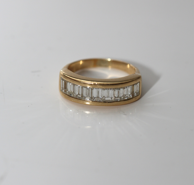 18ct Yellow Gold Baguette Diamond Ring. Diamonds totalling 1 Carat. Size O. 6.55 Grams - Image 2 of 2