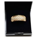 18ct Yellow Gold 29 Diamond & 2 Emerald Band. Size V. 12.65 Grams