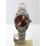 Rolex Ladies Datejust. Model 79174. Year 2004. 18ct White Gold Bezel & Salmon dial. 26mm Case.