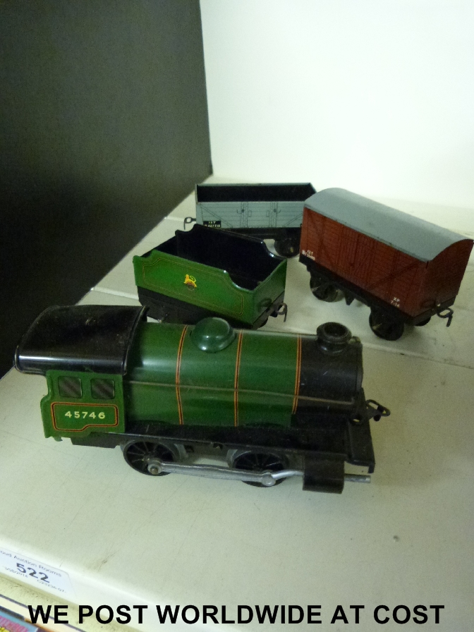 Hornby 0 gauge clockwork locomotive and tender 45746 together with brake can and open wagon