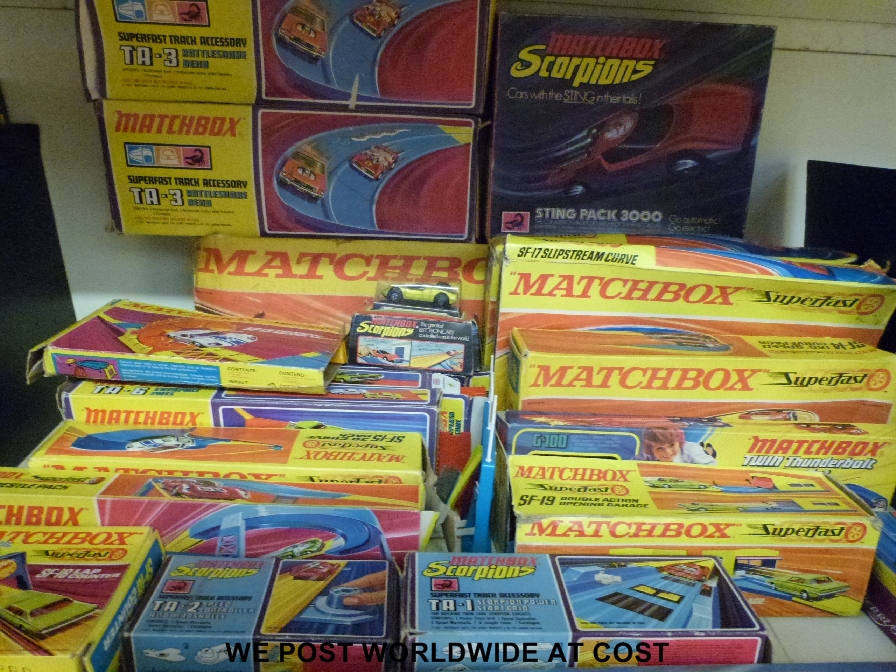 Over 20 Matchbox Superfast sets and accessories, all in original boxes