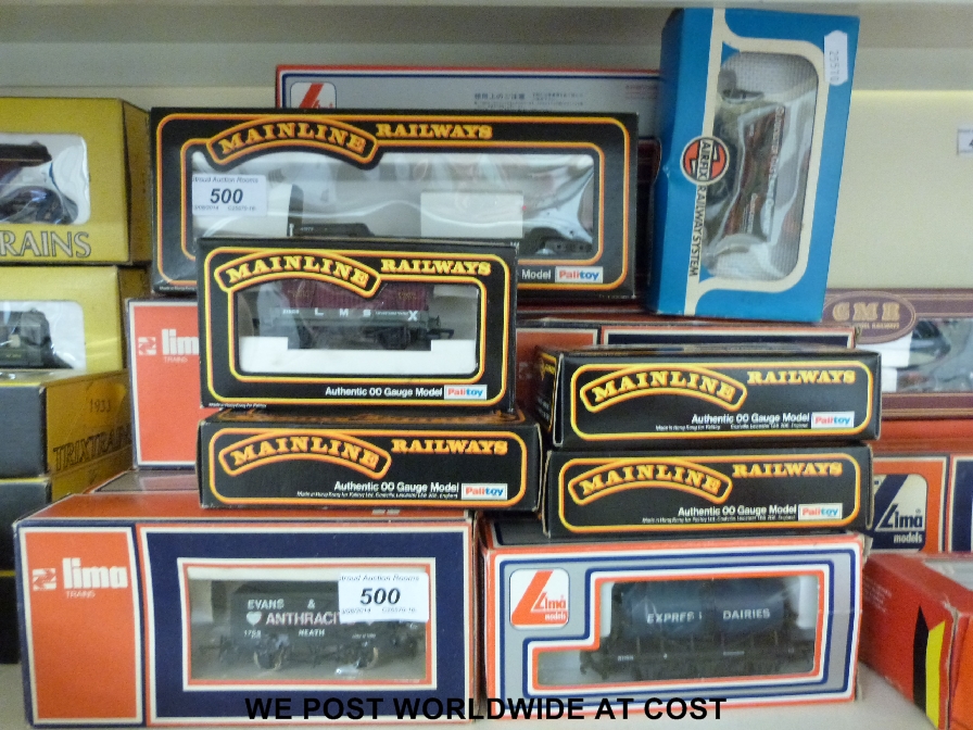 Over 20 Lima, Mainline, and Airfix 00 gauge carriages and wagons, all in original boxes.