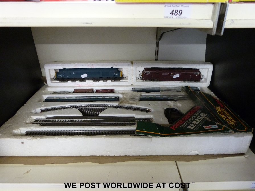 Three 00 gauge railway sets comprising a Tri-ang R3X electric goods train set, a Tri-ang R119