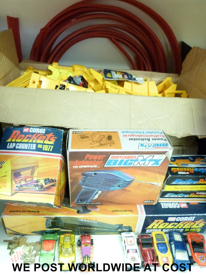 A Corgi Rockets set with extra cars and accessories, most in original boxes