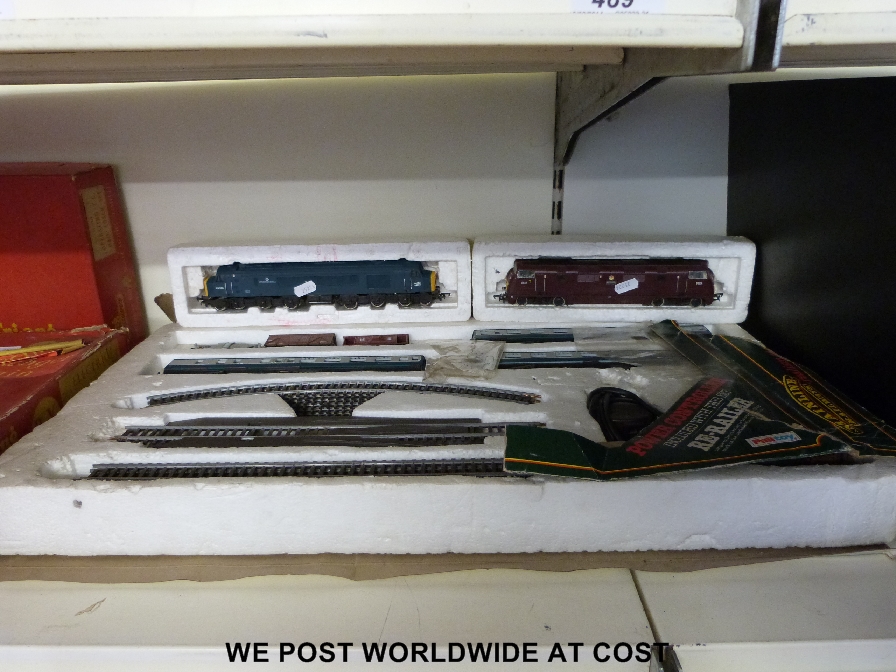 A collection of Tri-ang 00 gauge locomotives, carriages, wagons and accessories, some in original