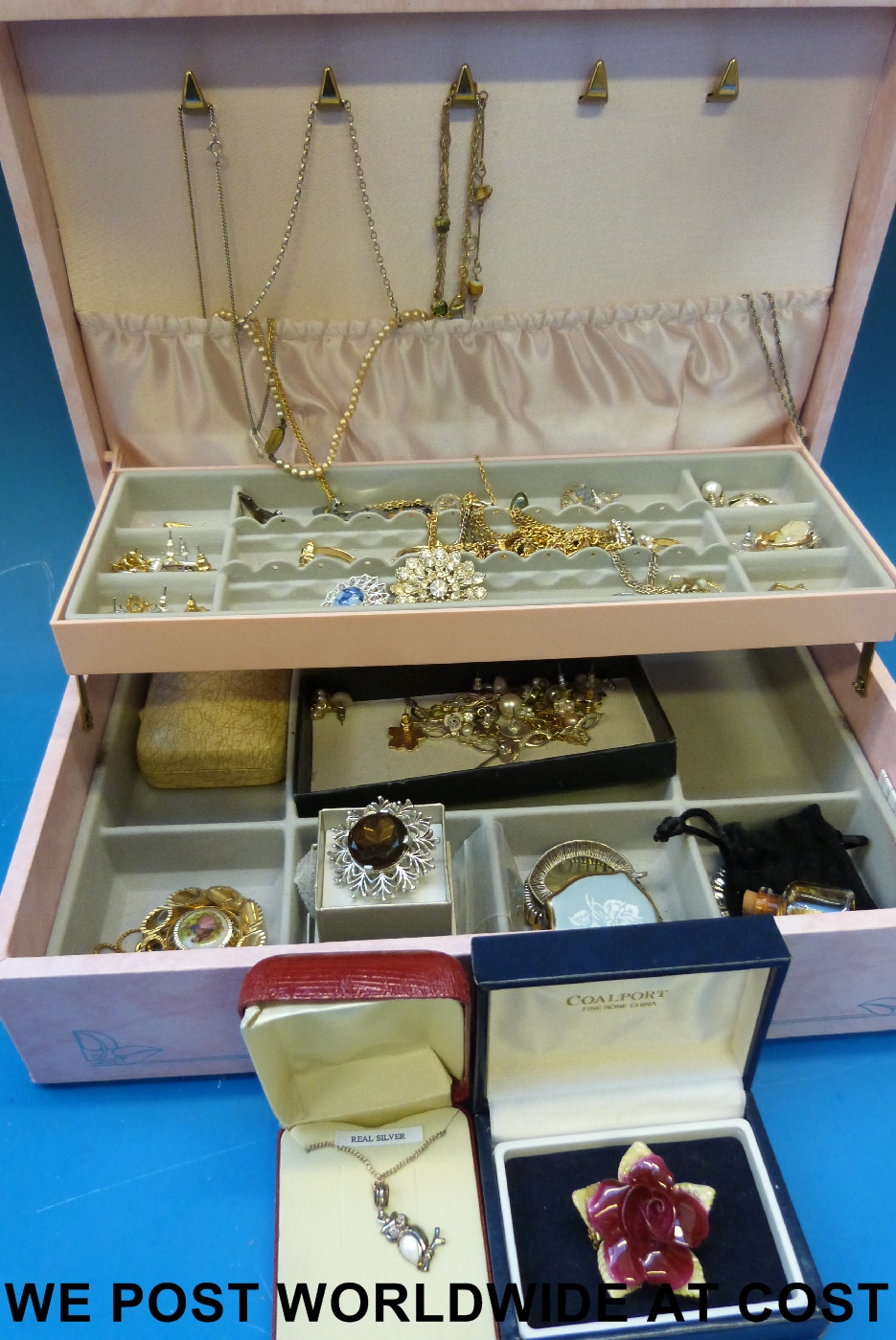 A large quantity of costume jewellery, mostly boxed, some new to include pearls and various silver