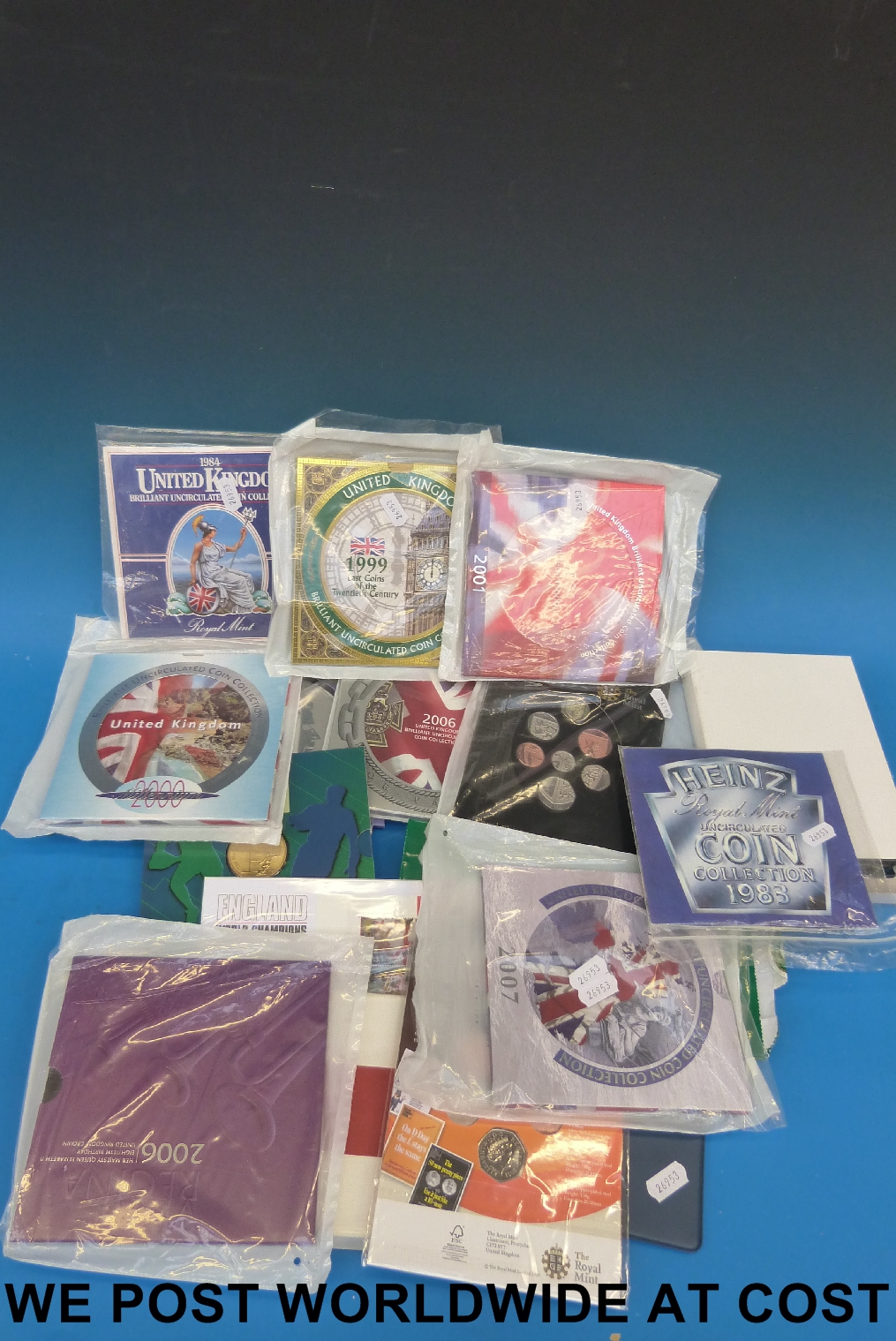 A quantity of uncirculated cased brilliant coin sets, largely UK but also includes Australian