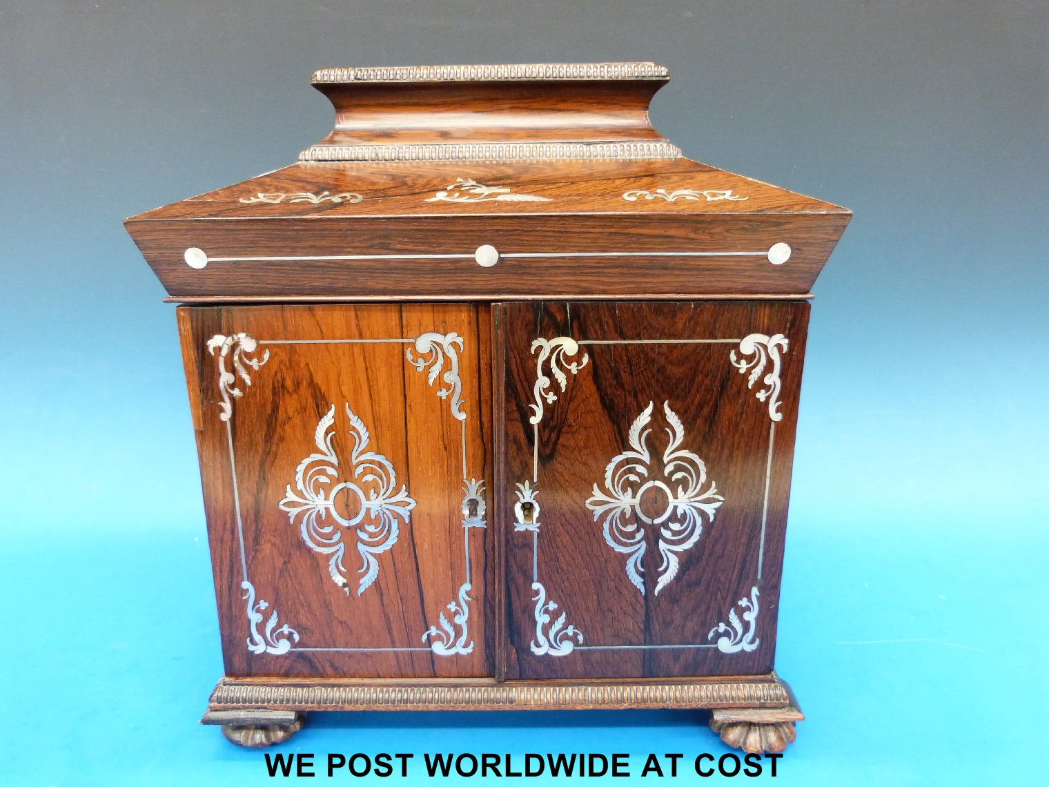 A 19thC rosewood mother of pearl inlaid jewellery/work box, the top lifting to reveal a gilt leather