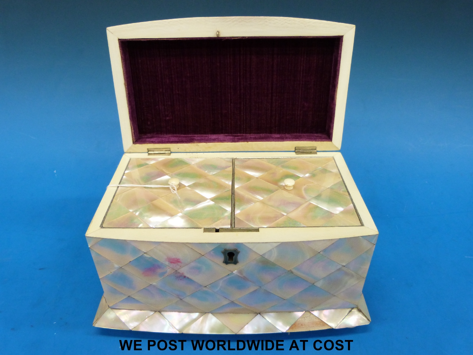A mother-of-pearl two-division tea caddy with chamfered lid, bow front and flared base, raised on - Image 3 of 3
