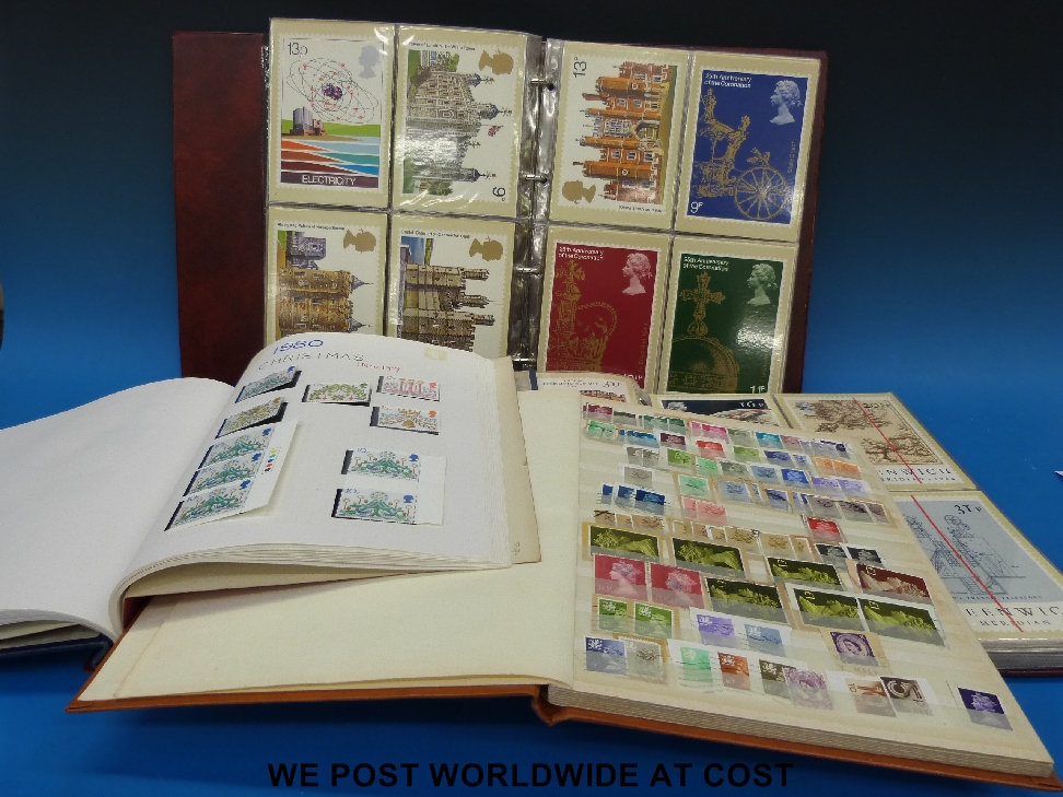 Two albums of P.H.Q. cards and two other albums of mainly G.B stamps