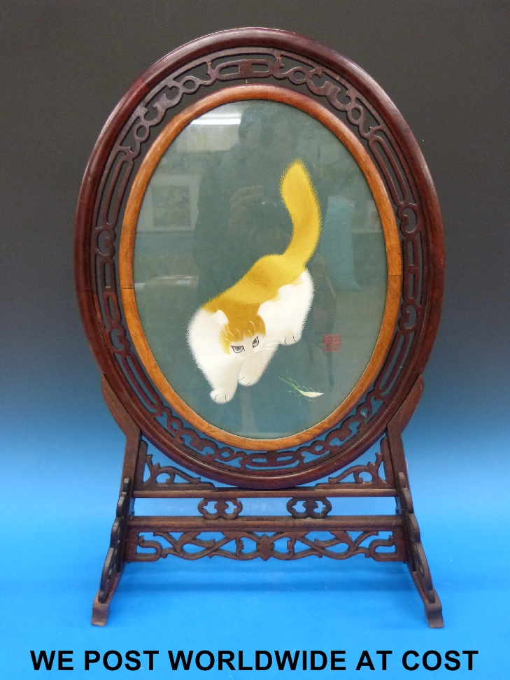 A Japanese silk screen with cat and grasshopper, in fretwood frame, height 74cm - Image 2 of 3