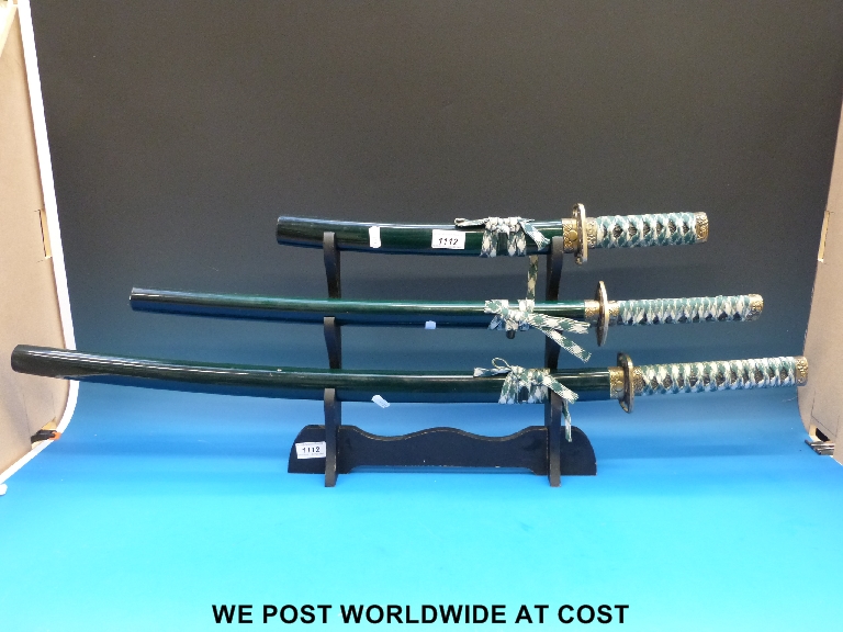 A set of three modern Samurai swords
