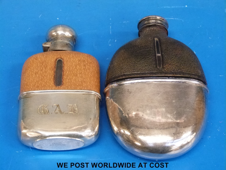 A silver plate mounted hip flask with pull off cup together together with another similar hip flask