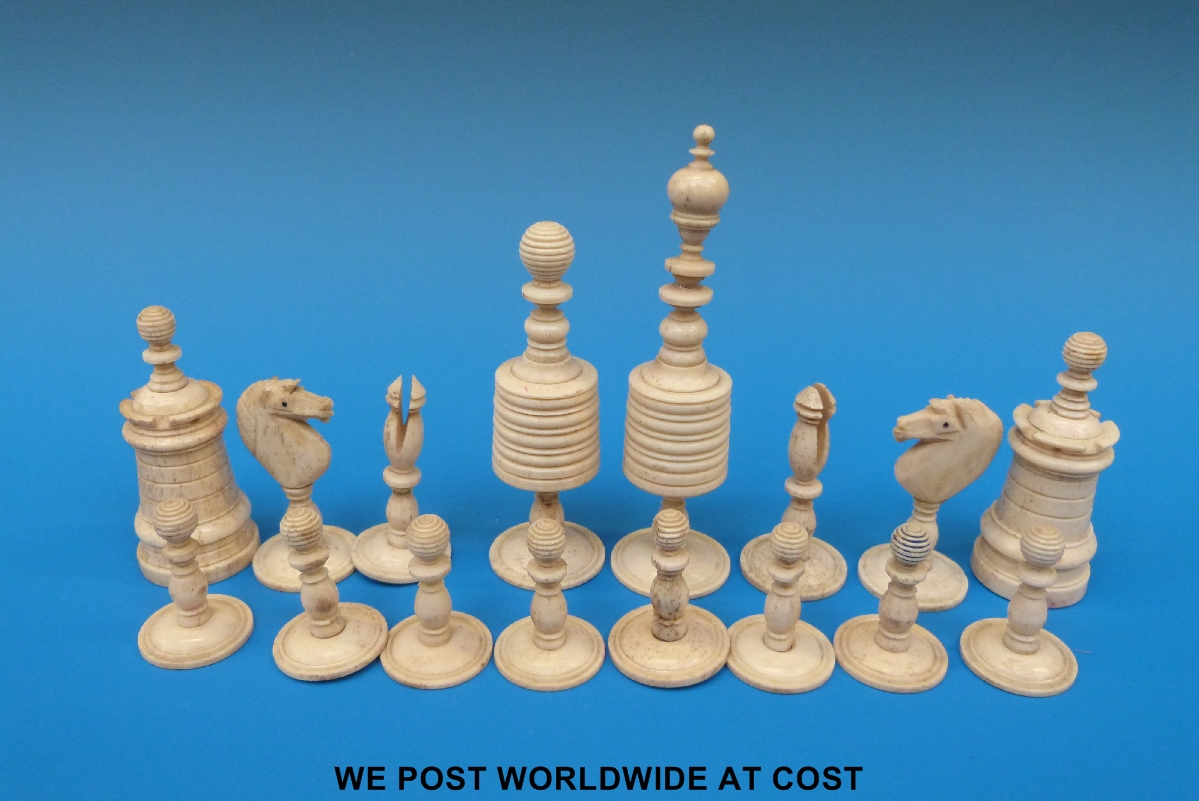 A 19thC barleycorn stained bone chess set with turned bases, height of king 9 cm.