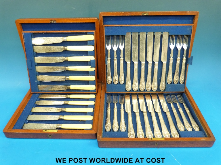 Two mahogany cased sets of plated cutlery including a set of fish cutlery and a 12-place setting